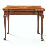 A GEORGE I BURR-YEW AND WALNUT CONCERTINA-ACTION CARD TABLE - фото 1