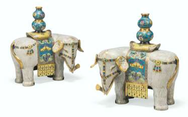 A PAIR OF CHINESE CLOISONNE ENAMEL ELEPHANTS