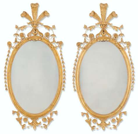 A PAIR OF GEORGE III GILTWOOD OVAL MIRRORS - фото 1