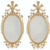 A PAIR OF GEORGE III GILTWOOD OVAL MIRRORS - Foto 1