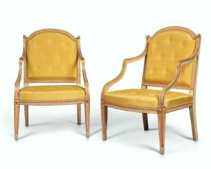 A PAIR OF GEORGE III PARCEL-GILT, CREAM AND POLYCHROME-PAINTED OPEN ARMCHAIRS
