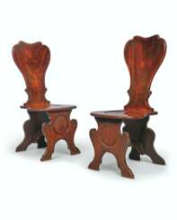 A PAIR OF GEORGE II MAHOGANY &#39;SGABELLO&#39; HALL CHAIRS