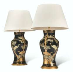 A PAIR OF CHINESE BLACK AND GILT PAPIER-MACHE VASES MOUNTED AS LAMPS