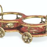 AN ENGLISH BRASS-MOUNTED RED JAPANNED PAPIER-MACHE DECANTER-TROLLEY - фото 1