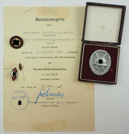 Verwundetenabzeichen, 1939, Silber mit Urkunde für einen Fallschirm-Obergefreiten der 8./ Fallschirm-Jäger-Regiment 4. - photo 1