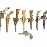 Uhrenschlüssel: interessantes Konvolut von 8 Uhrenschlüsseln in Pistolenform, 1800-1850 - Foto 1