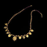 Halskette mit Gold-und Granatperlen - Foto 1