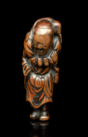 Netsuke eines stehend Affengauklers aus Buchsbaum - photo 1