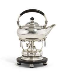 Silver kettle on rechaud
