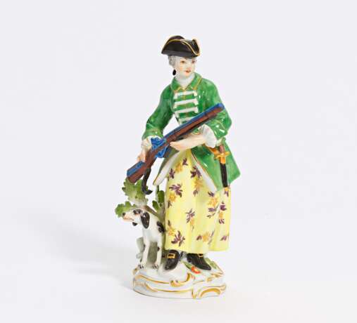 Porcelain figurine of a huntress with shotgun and dog - photo 1