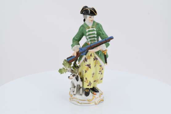 Porcelain figurine of a huntress with shotgun and dog - photo 2