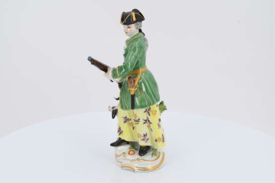 Porcelain figurine of a huntress with shotgun and dog - photo 3