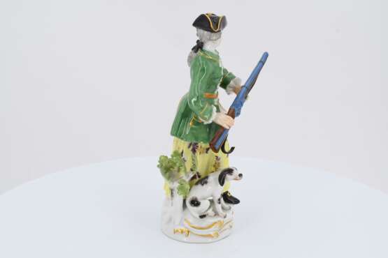 Porcelain figurine of a huntress with shotgun and dog - photo 5