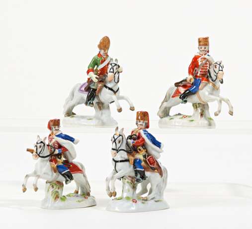Porcelain figurines of four hussars on horseback - photo 1