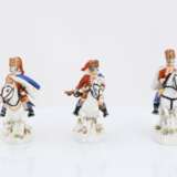 Porcelain figurines of four hussars on horseback - photo 5