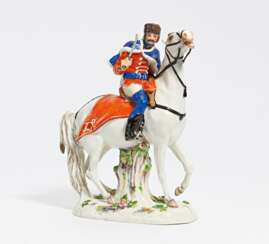 Porcelain figurine of a riding hussar