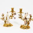 Pair of figural porcelain candle sticks - Auction prices