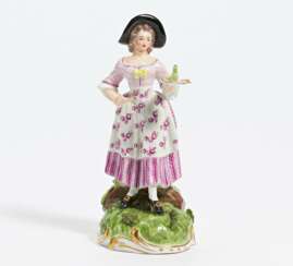 Porcelain figurine of lady with tray