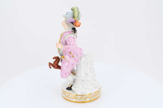 Porcelain figurines of boy with stick horse and lady feeding kitten - photo 5