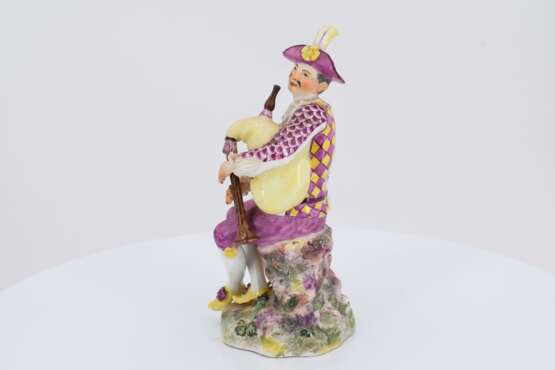 Porcelain figurine of a packpipe player - photo 3