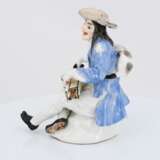 Porcelain figurine of beggar with hurdy gurdy - photo 3