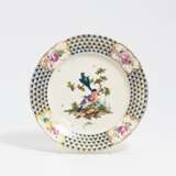 Porcelain plate with bird décor - photo 1