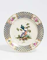 Porcelain plate with bird décor