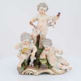 Porcelain group of putti with dog - photo 2