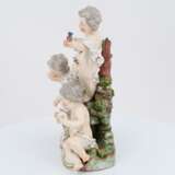 Porcelain group of putti with dog - photo 3