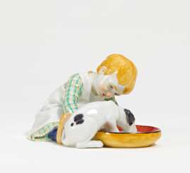 Porcelain figurine of girl with a drinking dog