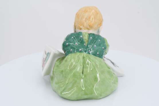 Porcelain figurine of child with storybook - photo 4