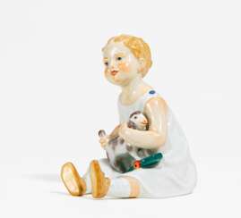 Porcelain figurine of sitting girl with sheep