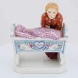 Porcelain figurine of girl with cradle - photo 2