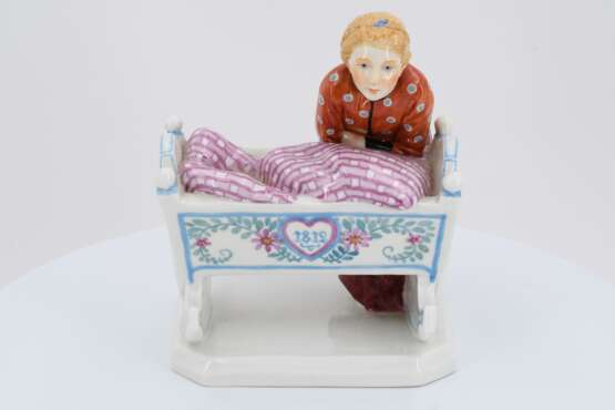 Porcelain figurine of girl with cradle - photo 2