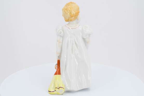 Porcelain figurine of girl with doll - photo 4