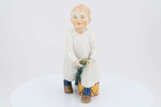 Porcelain figurine of boy with drumstick and drum - photo 2