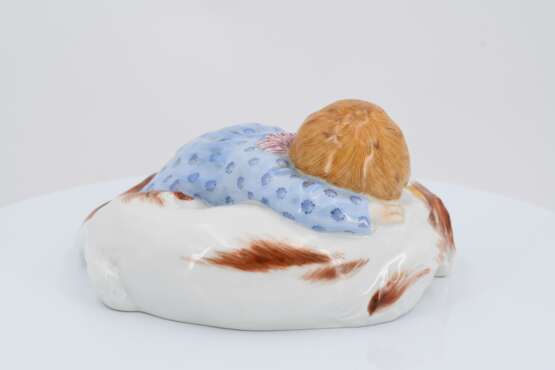 Porcelain figurine of child lying on dog - photo 4