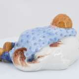 Porcelain figurine of child lying on dog - photo 5