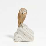 Little porcelain barn owl on architecture - фото 1