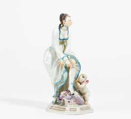 Porcelain ensemble of lady with cupid