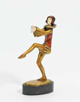 Broze figurine of harlequin standing on one leg
