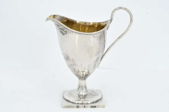 Footed silver milk jug - фото 4