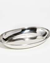 Oval silver serving dish with serrated rim