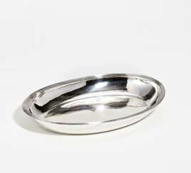 Oval silver serving dish with serrated rim