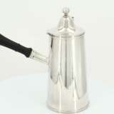 Silver coffee pot with side handle and sleek body - фото 4