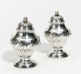 Pair of baluster-shaped George III silver casters