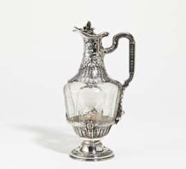 Silver and glass carafe with flower knob and laurel décor
