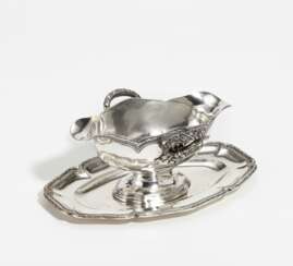 Silver sauce boat with laurel décor