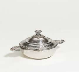 Silver lidded bowl with ornamental decor