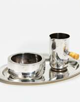 Set of oval tray, milk jug and sugar bowl all made of silver